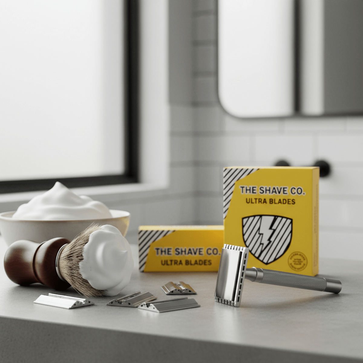 Safety razor blades and vintage brush with cream in a modern bathroom.