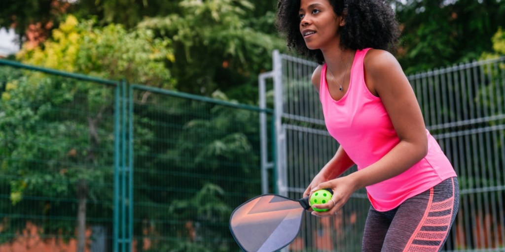 Woman playing pickleball