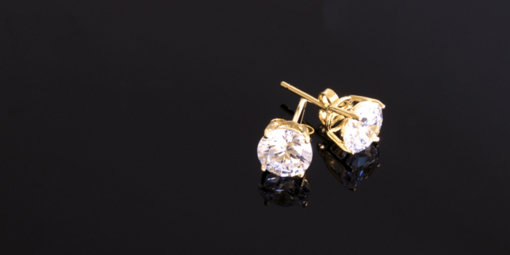 Gold and diamond stud earrings