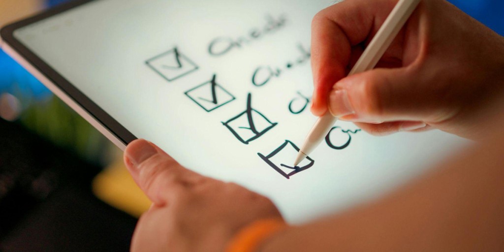 A digital checklist on a tablet