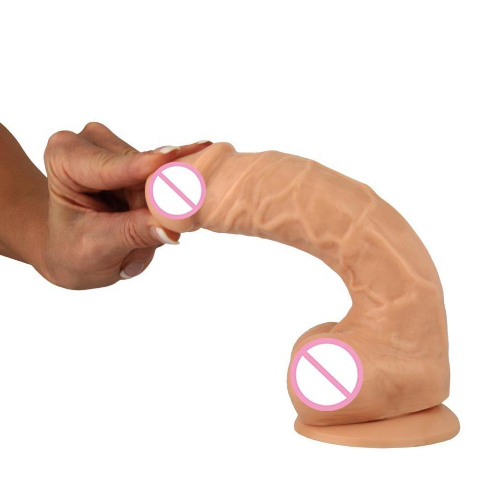 Vigorous lady is playing with her rubber fake penis