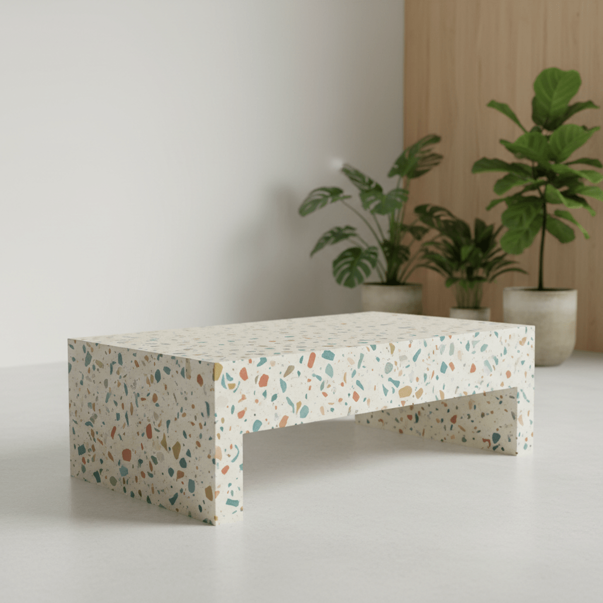 Eco-conscious terrazzo coffee table with muted blue, green, and earthy tones.