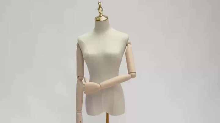 green emerald velvet dress Female Dress Form with Chrome Rolling Base