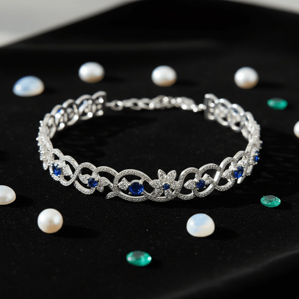 Modern silver tattoo choker with floral details and pearls. Sterling silver tattoo choker with floral motifs and pearls on black velvet.