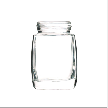 Sales of various models and sizes beehive wide mouth glass honey bottles with plastic cap honey glass jar