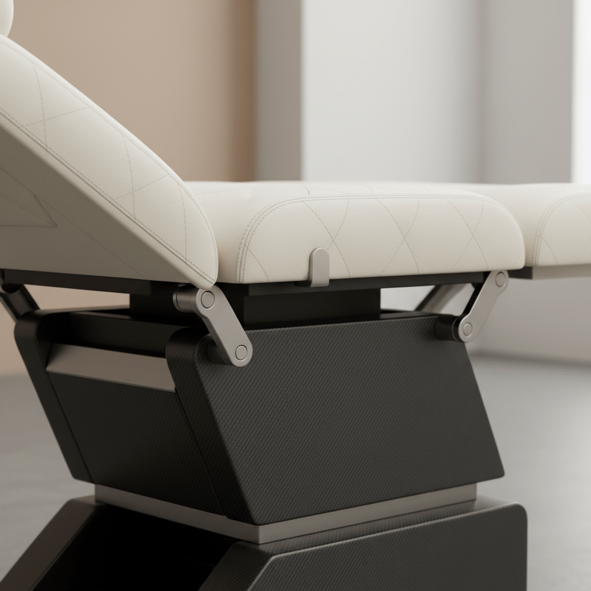 Close-up of a premium hydraulic massage table with ivory eco-leather upholstery.