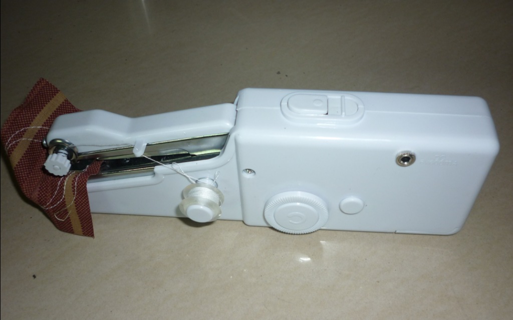 Mini Machine à coudre portative, couture à point pratique et pratique, à la main, similaire à la télévision, bas prix