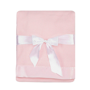 muslin blanket with satin trim