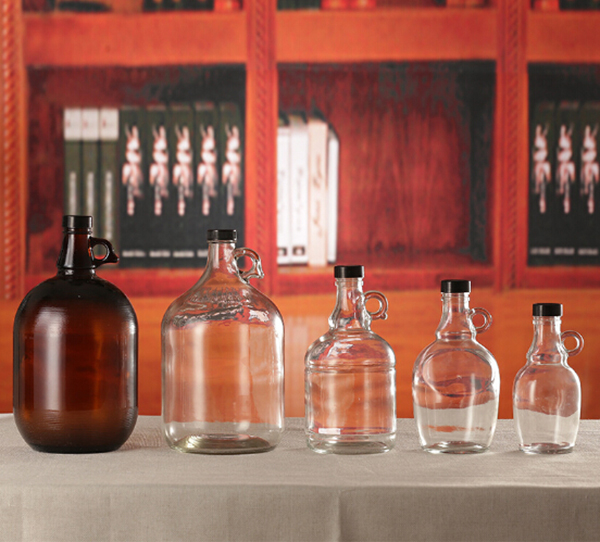 Wholesale Big beer wine glass bottle with handle