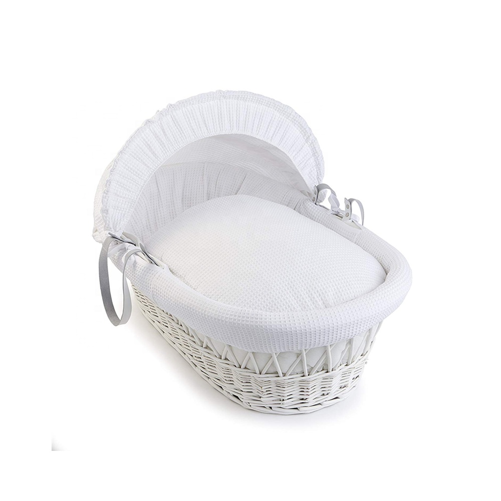 white moses basket and stand