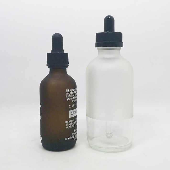 matte brown amber and clear frosted glass boston round bottle for skin care