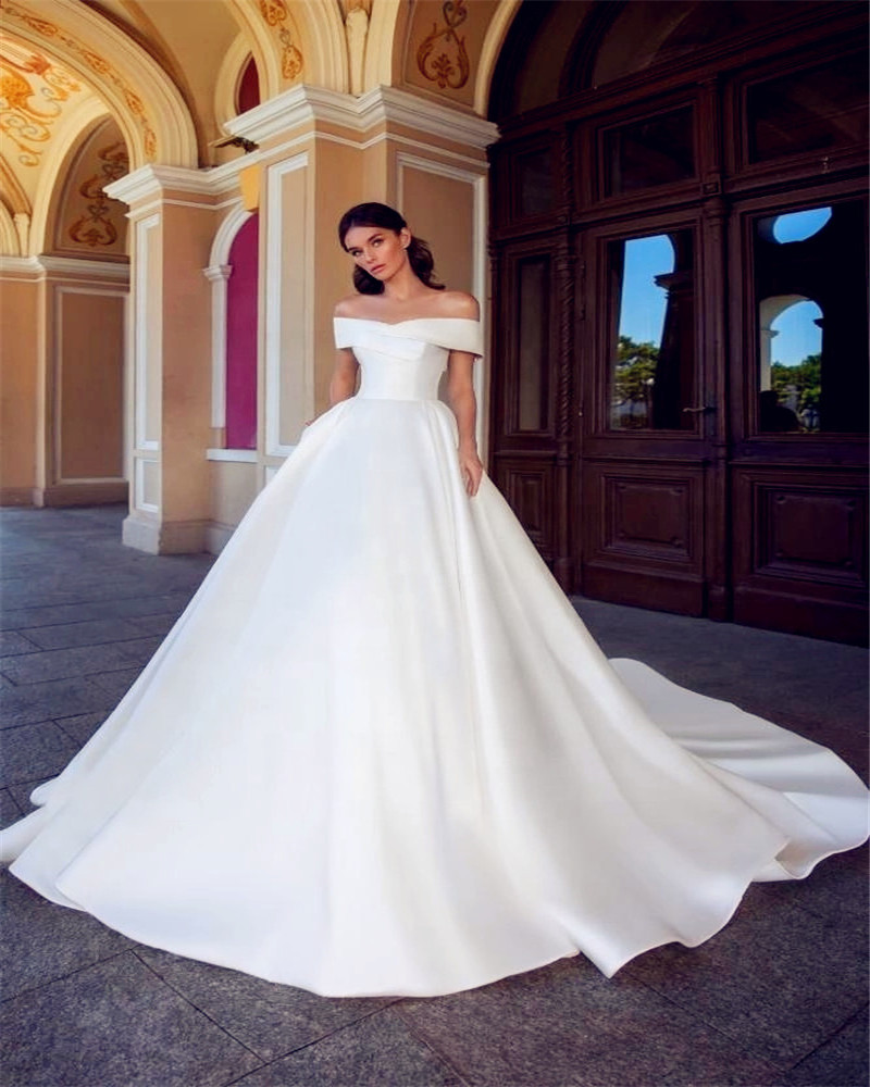 off the shoulder satin wedding gown