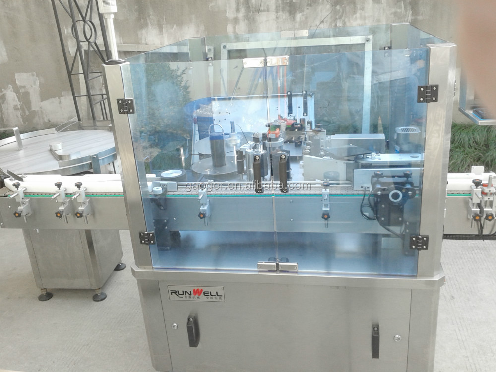 Машина для нанесения этикеток шприцами