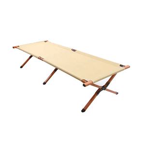 wooden camping cot