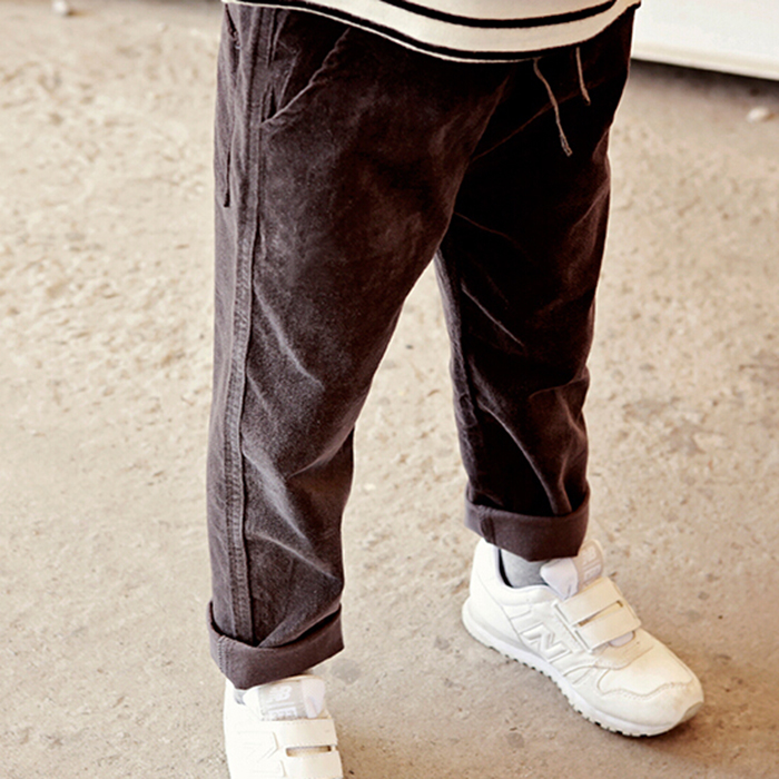 boys in plastic pants