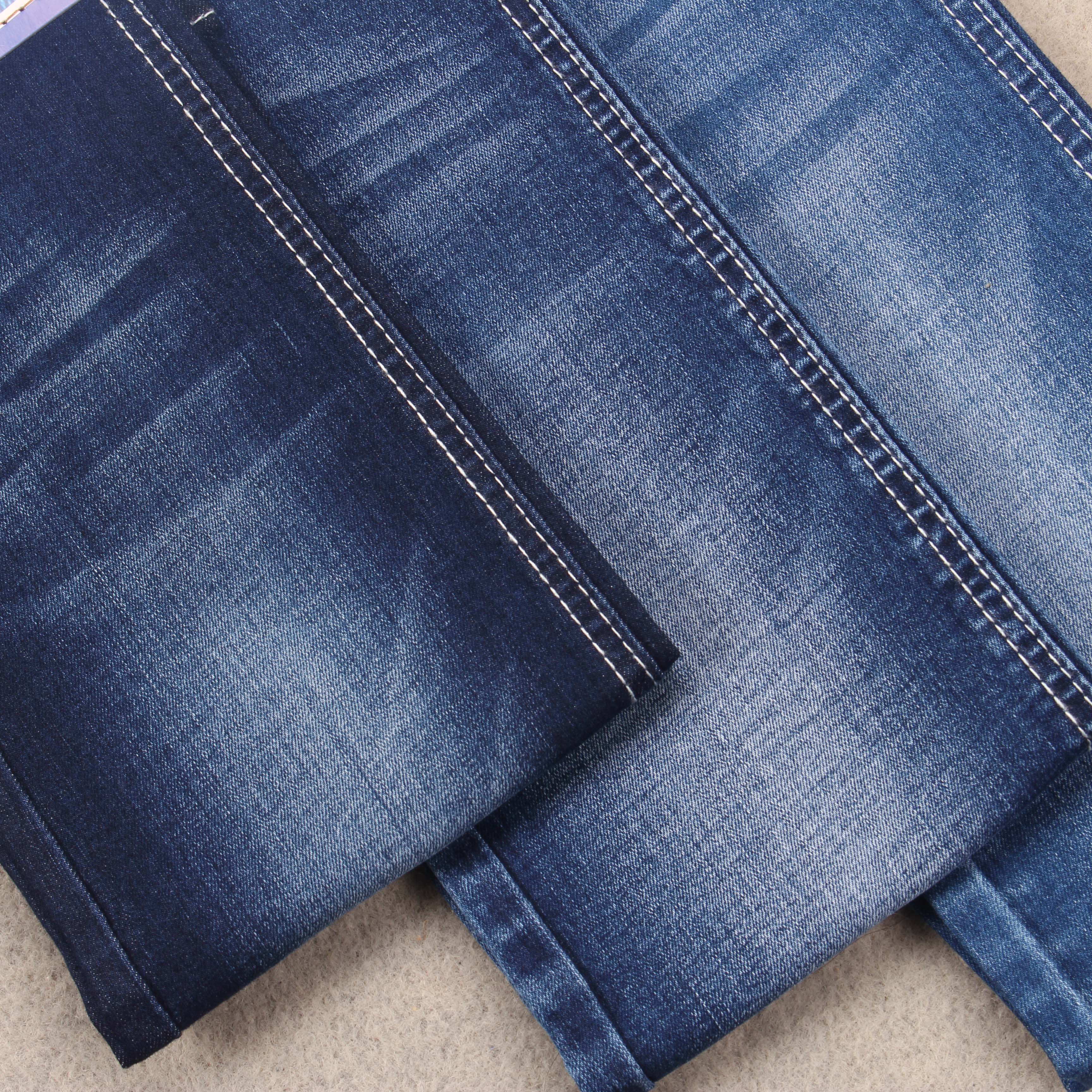 Хорошо тянущаяся джинсовая ткань из хлопка и вискозы и спандекса с деформацией