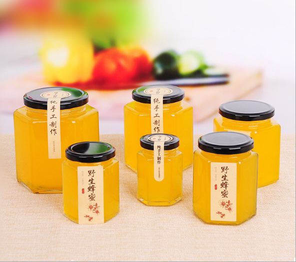 Hot selling wholesale different sizes hexagon shape honey glass jar