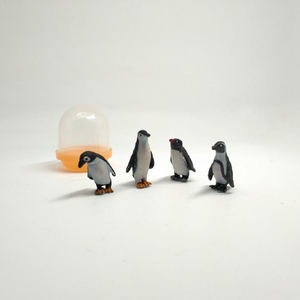 small plastic penguin figurines
