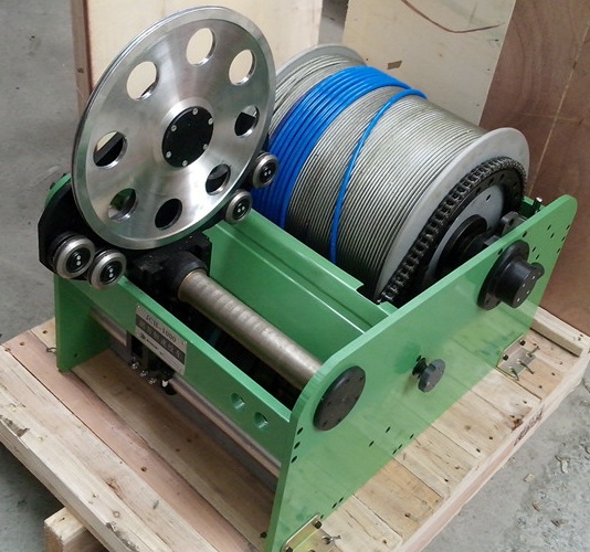 Long cable pulling winches, cable pullers and geophysical logging