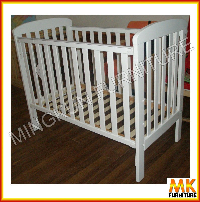 white wooden cot