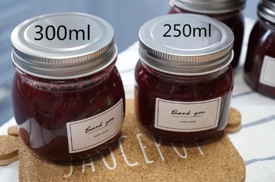 Round glass jar for honey jam with airtight lid