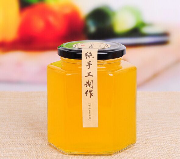 Hot selling wholesale different sizes hexagon shape honey glass jar