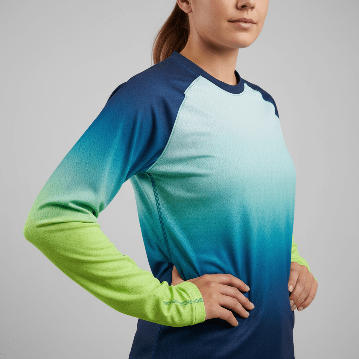 Female soccer player's jersey sleeve with a smooth ombre color fade from wrist to shoulder.