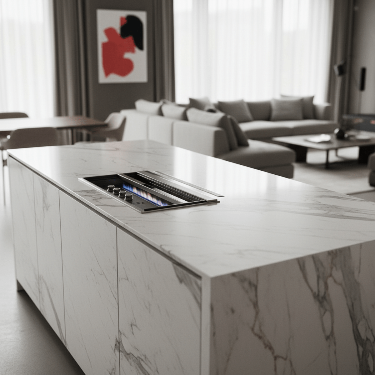 Futuristic retractable gas stove integrated into a Calacatta marble kitchen island.