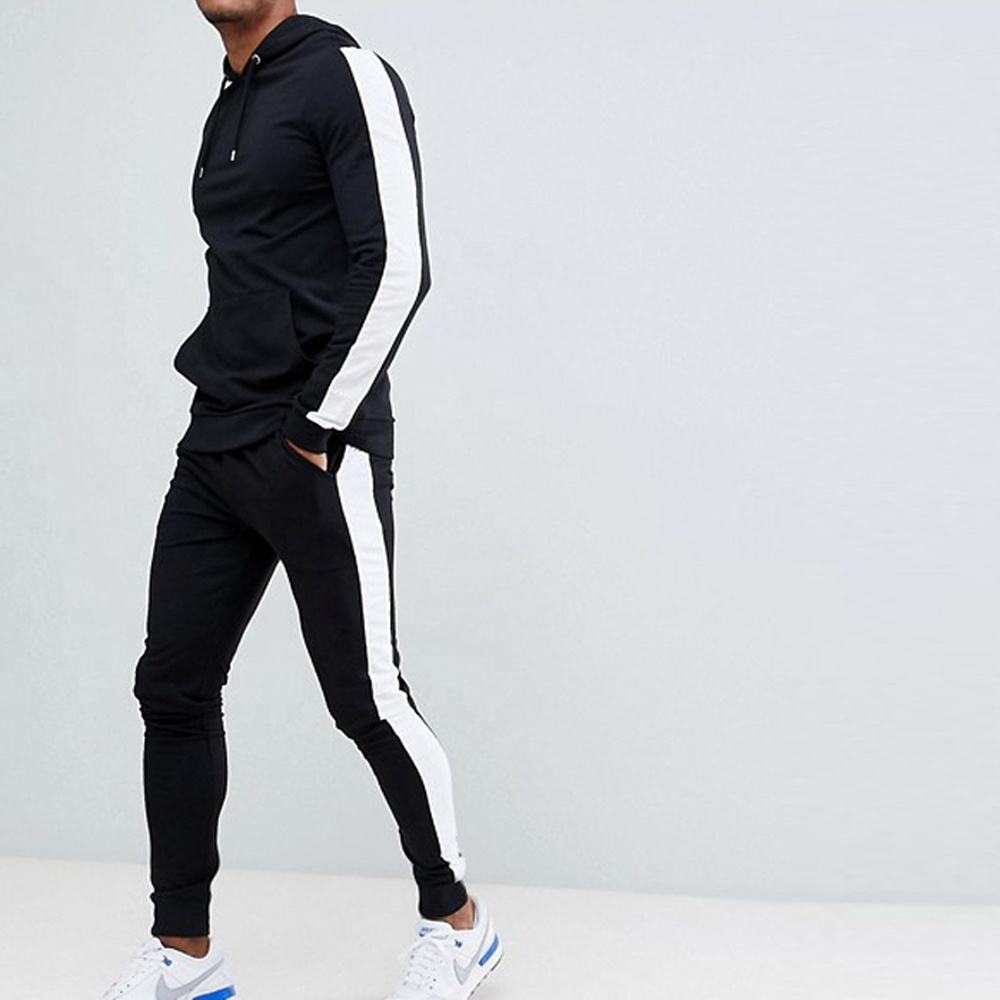 Спортивный костюм new balance. Костюм спортивный Пума с лампасами. Adidas Tracksuit Black. Костюм спортивный мужской найк чёрный с белыми лампасами.