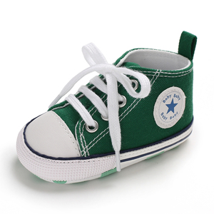 infant white canvas shoes