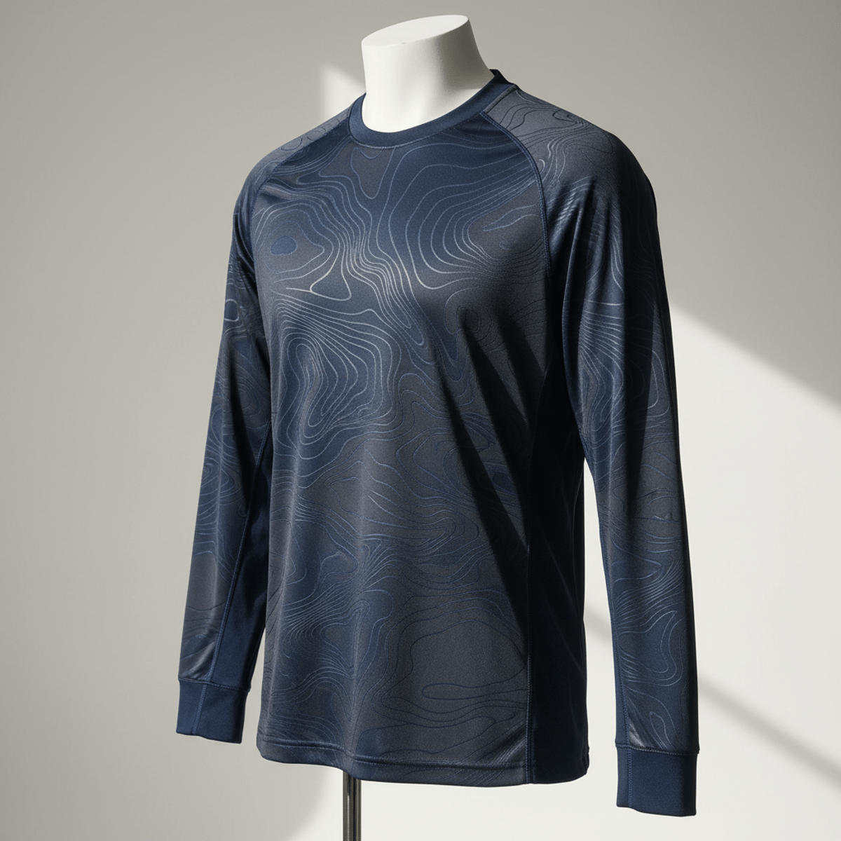 Long sleeve soccer jersey with embossed topographical lines inspired by mountain ranges.