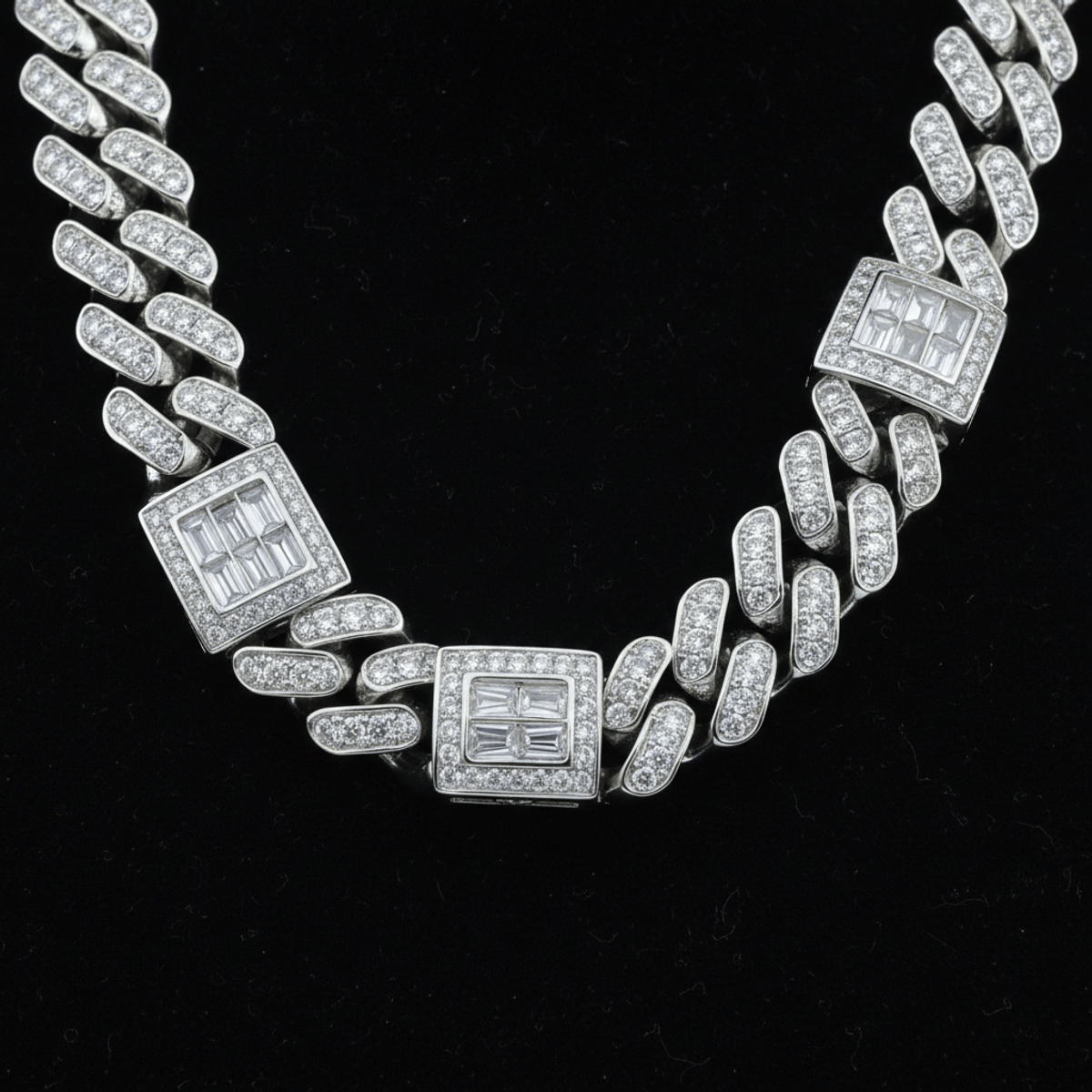 Close-up of a moissanite baguette Cuban link necklace with icy brilliance.