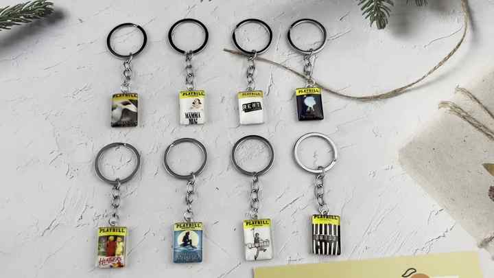 Grazioso portachiavi a bottone con ornamento multifunzionale