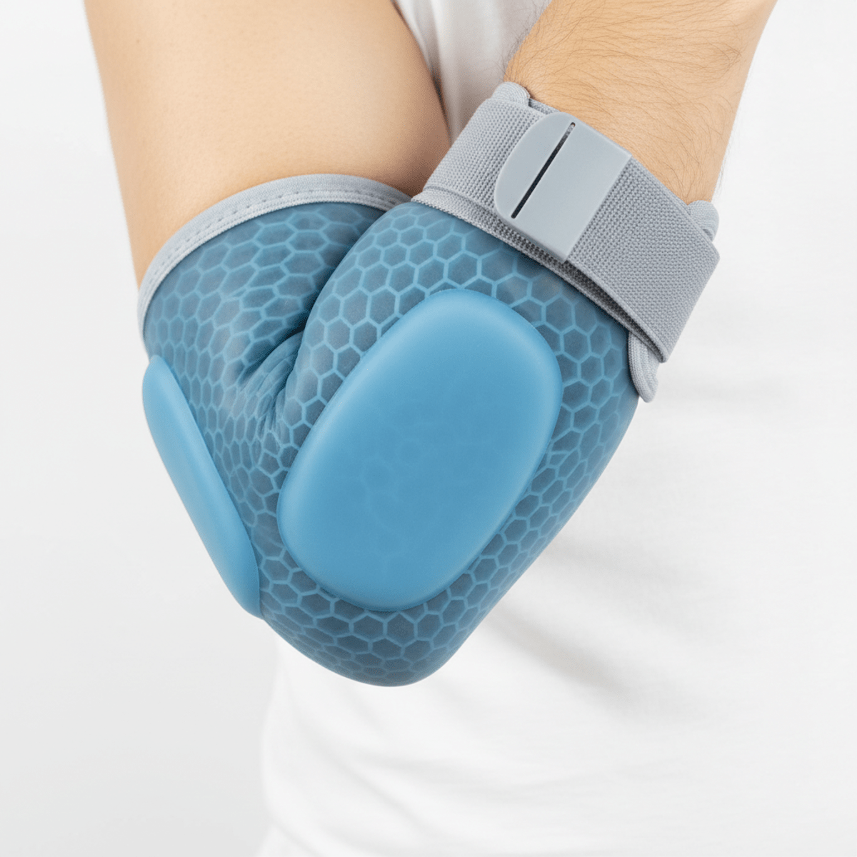 Translucent silicone gel elbow brace with honeycomb structure, offering flexible forearm support.