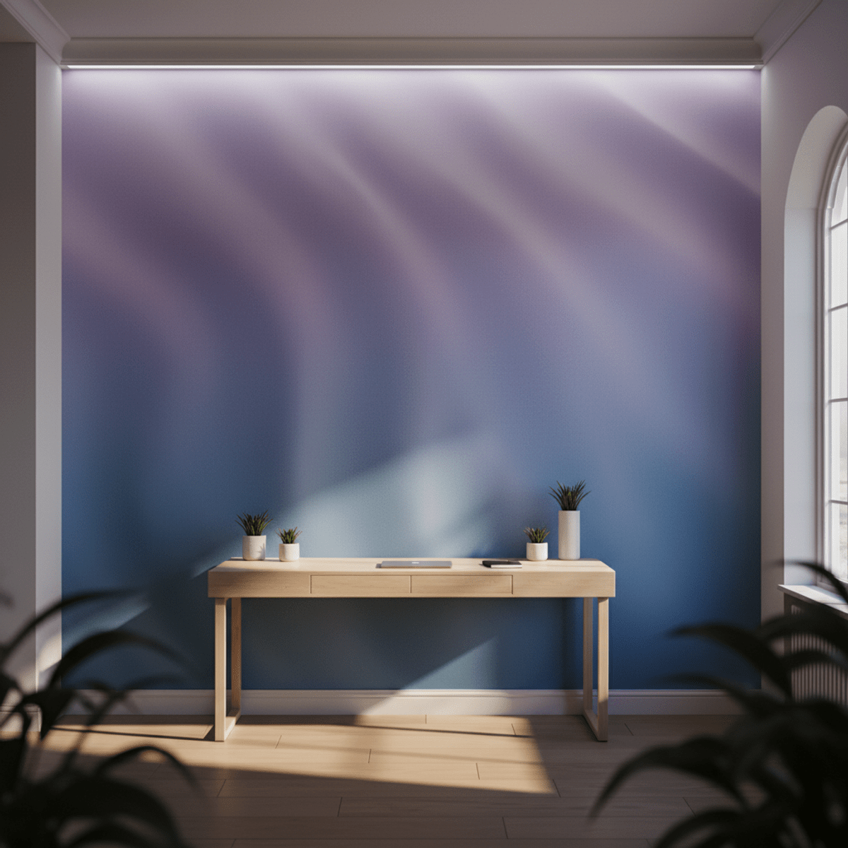 Calming gradient wallpaper in a creative studio setting. Modern studio with cool-toned gradient wallpaper, wooden desk, and plants.