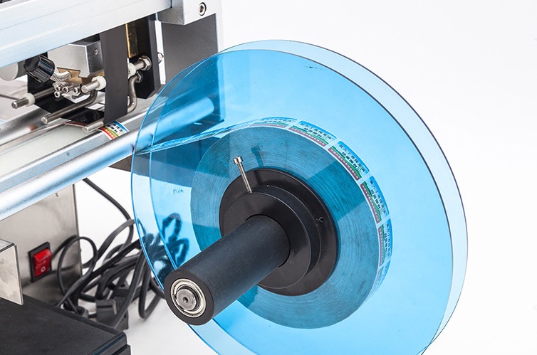 图片关键词 Hand Held Manual Round Bottle Labeling Machine With Printing Code,Manual Bottle Labeler