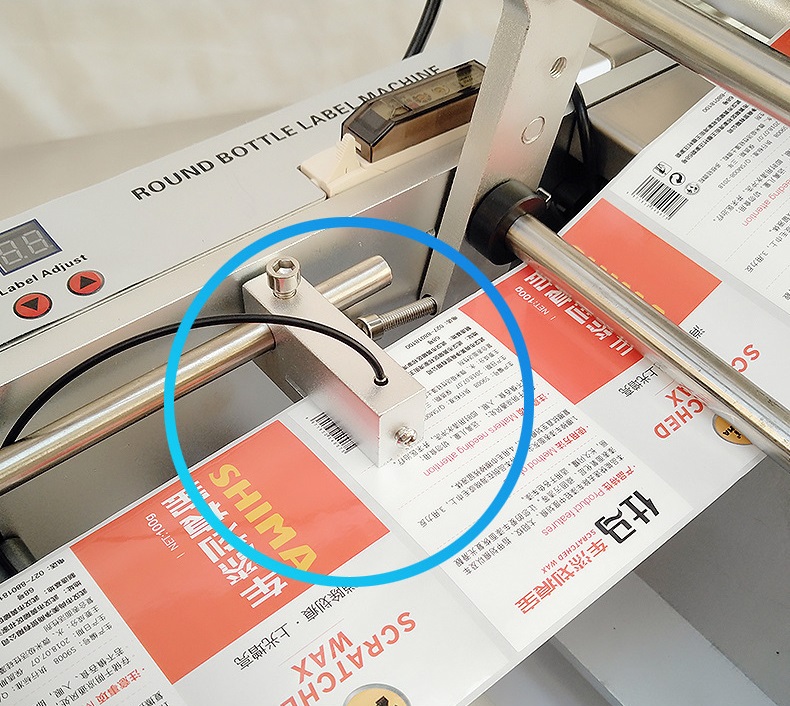 图片关键词 Hand Held Manual Round Bottle Labeling Machine With Printing Code,Manual Bottle Labeler