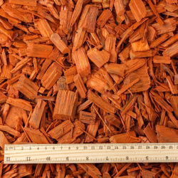 Orange colored wood chips mulch