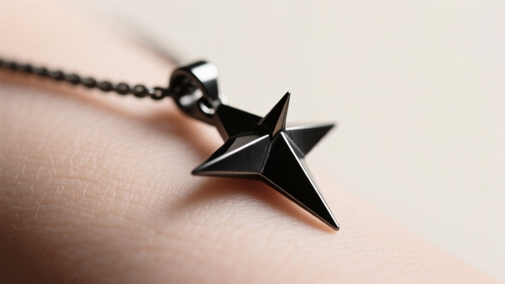 Macro shot of a blackened titanium thorn pendant with geometric edges against soft skin under diffused studio lighting
