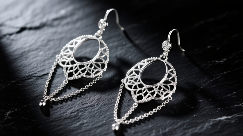 Macro shot of 925 sterling silver chandelier earrings with delicate filigree wirework and cascading chains on dark slate