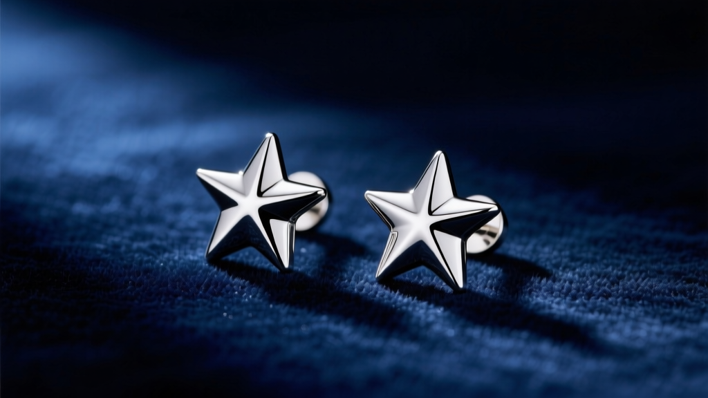 Polished 925 sterling silver star stud earrings resting on dark navy velvet, illuminated by soft directional studio lighting