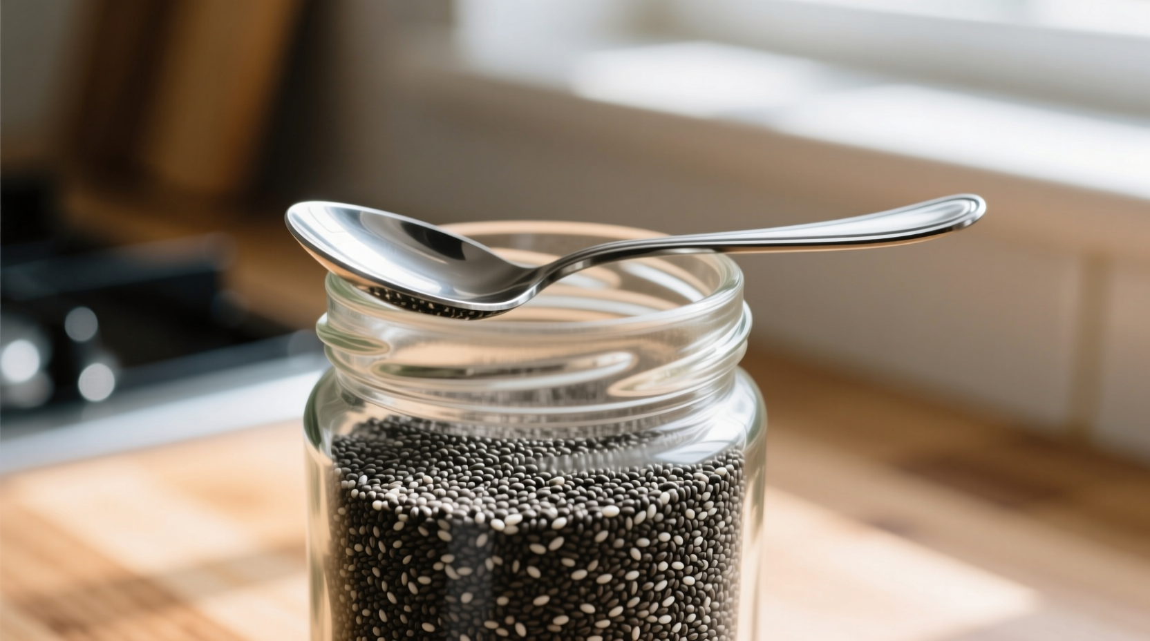 Chia seeds in glass jar with spoon