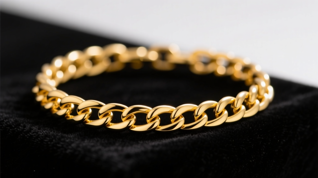 Macro shot of 14k gold filled chain bracelets on dark velvet, lit by soft studio lighting to highlight rich yellow metal texture.