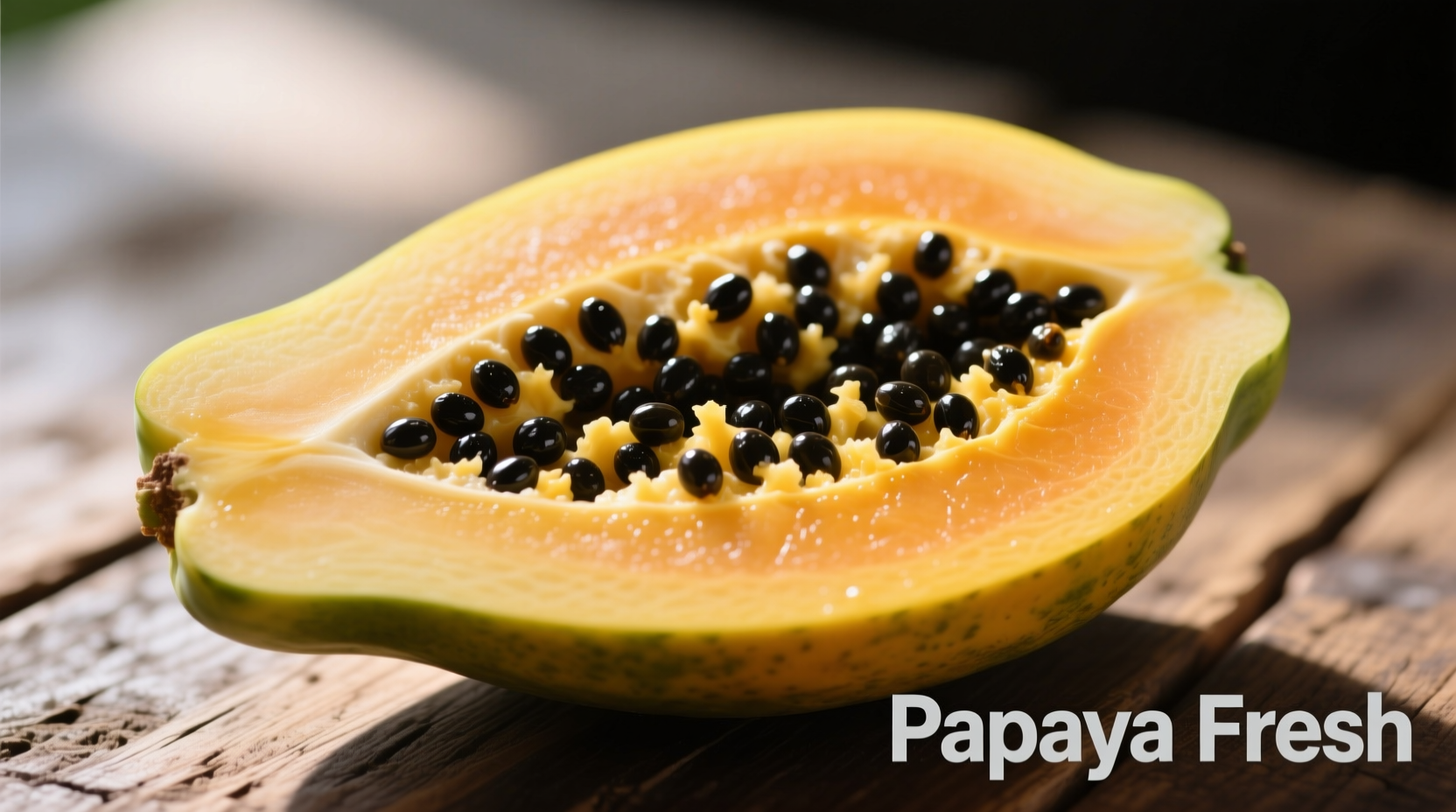 Ripe pawpaw fruit sliced open showing creamy yellow flesh