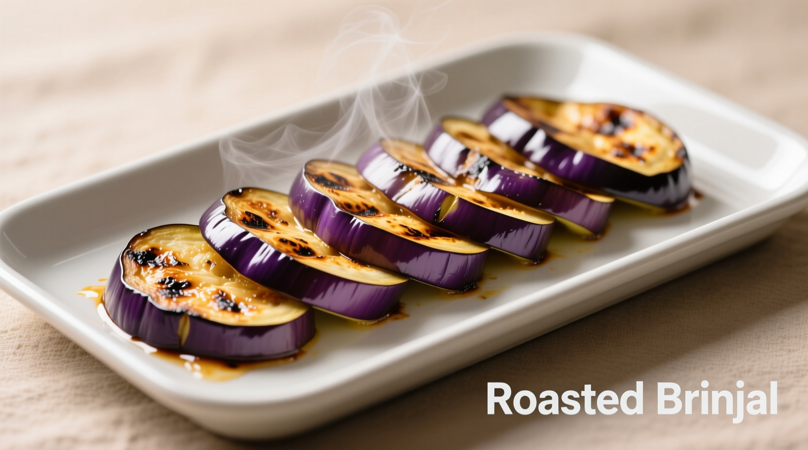 Perfectly roasted brinjal slices on baking sheet