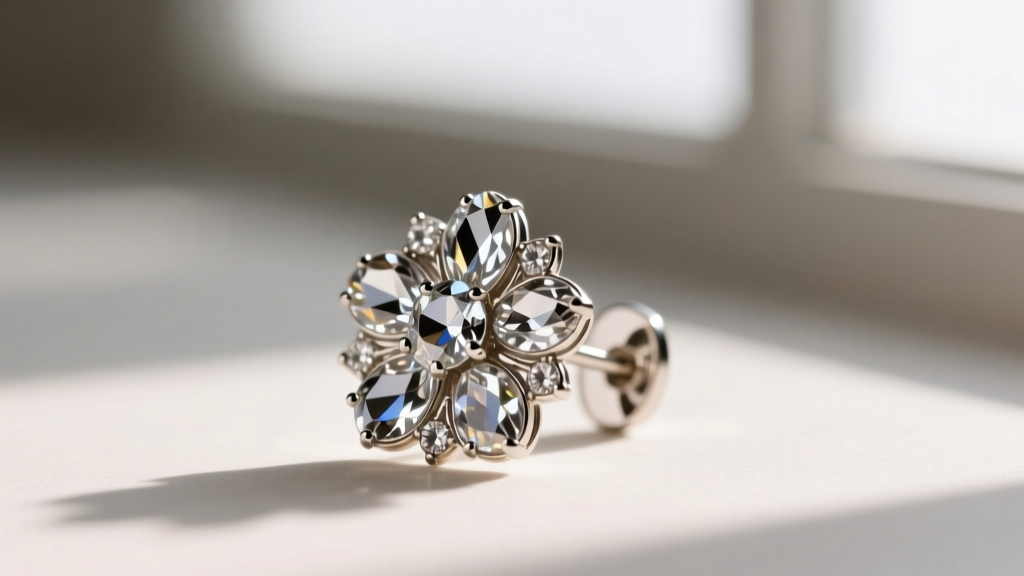 Close-up of vintage Weiss floral clip-on earring showing faceted chaton rhinestones and intact silver foil backing underneath.