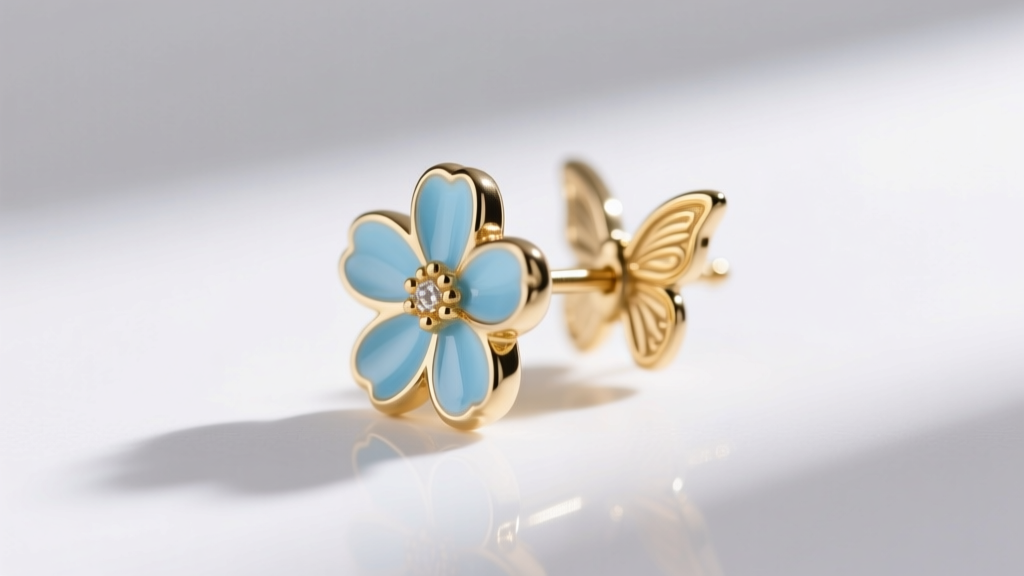 Side profile showing the 20-gauge post and butterfly backing of a demi-fine gold vermeil light blue flower drop earring on white.
