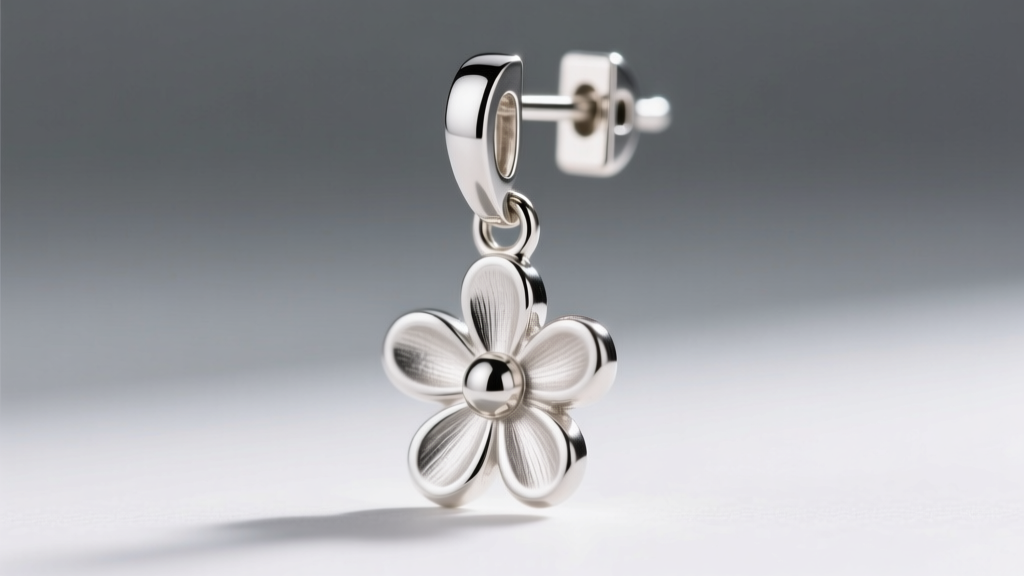 Close-up of an 18-gauge leverback clasp on a silver daisy dangle earring, highlighting the secure locking mechanism and hinge.