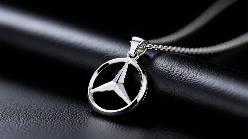 Sterling silver Mercedes Benz necklace pendant with the three-pointed star resting on dark leather in soft studio lighting