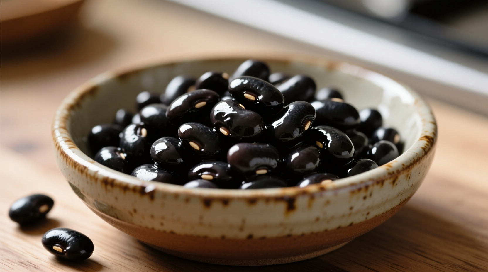 Perfectly cooked black beans in ceramic bowl